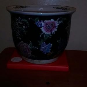 Porcelain hand painted enameled dynasty era flower